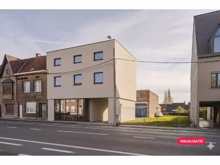 opbrengsteigendom met handelspand en 2 appartementen te koop in wevelgem