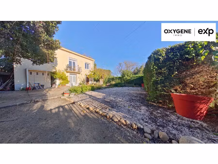 maison 4 faces de 144 m² avec garage sur une parcelle de 3000 m