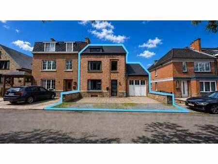 maison rénovée avec jardin et garage