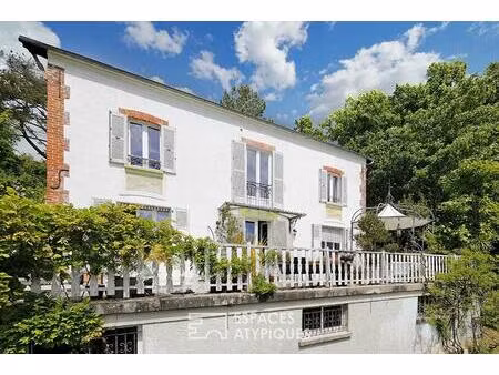 maison 1900 et son beau jardin paysager en bord de marne
