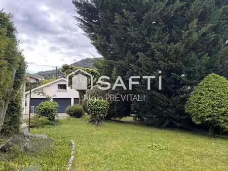 terrain de 616 m² avec garage  proche centre ville
