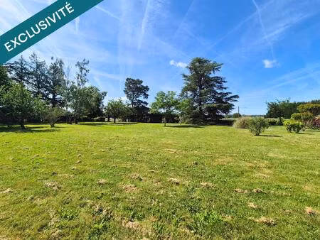 terrain à bâtir plat et arboré de 1259m2