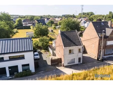 perceel grond nabij centrum erembodegem met zuidgerichte tuin