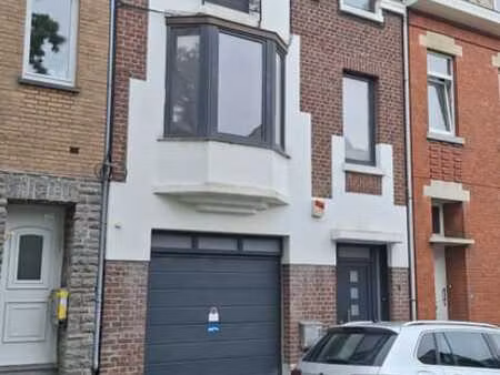maison 3 façades avec terrasse et garage