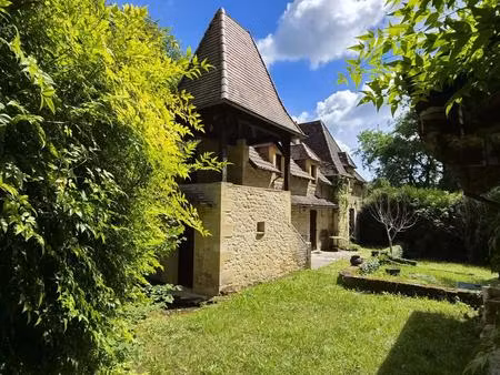 les eyzies - maison en pierres au calme dans un parc arboré