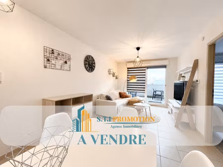 appartement 2 pièces avec terrasse  cave et parking à lexy !