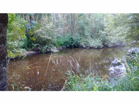 terrain de loisir avec étang  bois et rivière ? vallée de la cisse