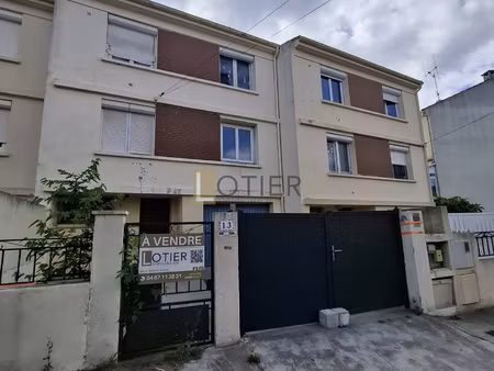 à vendre maison avec jardin et garage fort potentiel à r