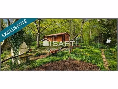 terrain de loisirs avec chalets bois