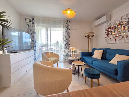 appartement t2 de m² avec garage au sein d'une résidence récente