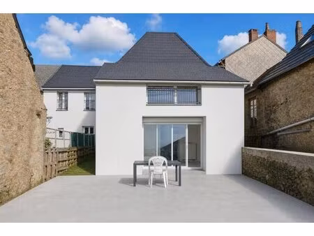 immeuble rénové loué avec jardin à château-chinon