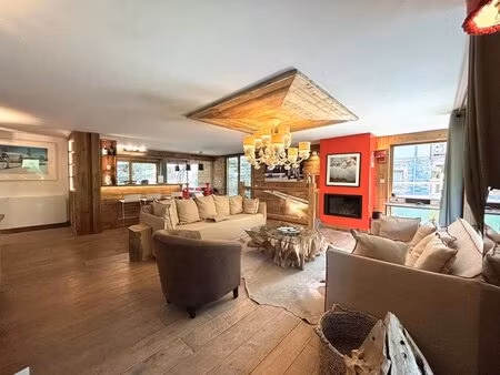 courchevel le praz – bien d’exception de 153 m² avec spa  5 chambres et parking couvert