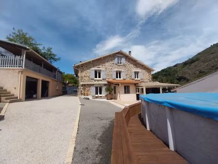 maison rénovée en pierre + dépendances 07410 arlebosc