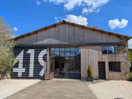 ancienne laiterie réinventée en loft galerie d'exception au