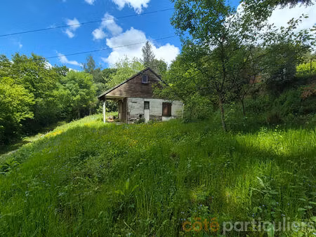 terrain de 826m² au lac avec chalet à rénover