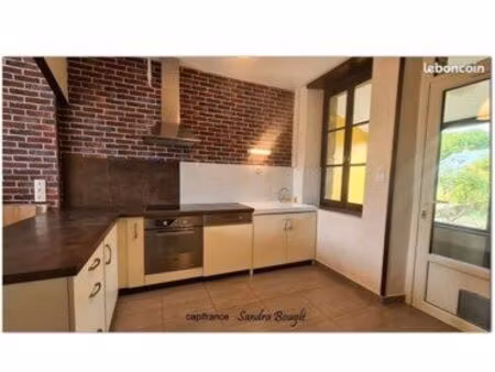 maison mitoyenne avec jardin et 1 chambre