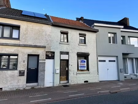 rijwoning met zij- en achteringang te gingelom