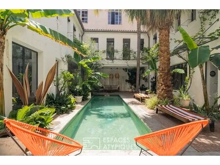 ancienne imprimerie réhabilitée en riad contemporain avec patio et piscine au coeur de...