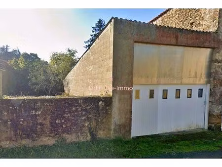 hangar à usage de garage  cave et stockage sur terrain de 65m²