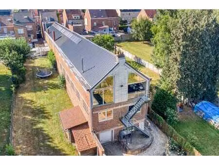 bâtiment polyvalent avec habitation et atelier