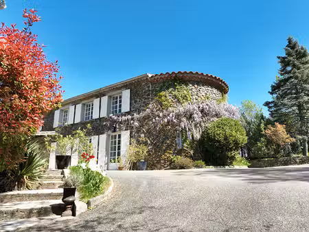 aux portes de la drôme : propriété de caractère avec tour  parc de 7 422 m² et piscine à d