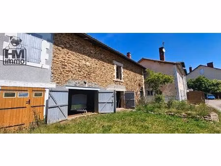 maison de ville avec appartement  garage double et terrain constructible!
