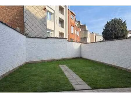basilique - rdc 87 m2  2 chambres  jardin et garage box.