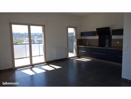 appartement t4 : 11ème étage plein sud + balcons 44m2 + 2 garages fermés