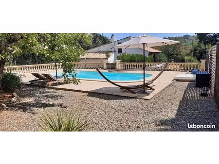 maison 4 pièces de 116 m² avec piscine et terrain de 1 500 m² à salavas