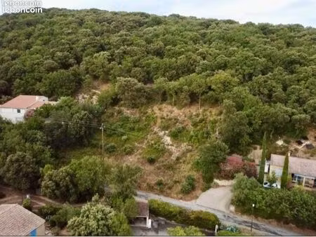 terrain constructible 1100 m² – vue dégagée – environnement calme-légère vu autoroute