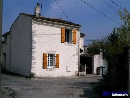 petite maison avec un étage