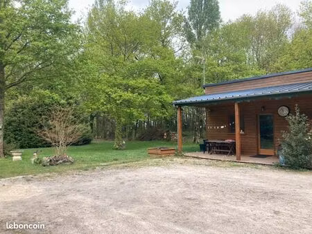 propriété avec 3 maisons