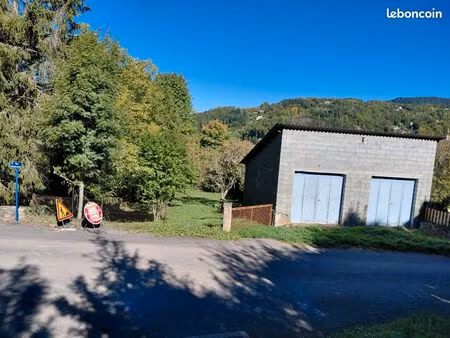 vends terrain constructible+2 garages
