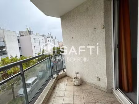 boutonnet – appartement traversant 3 pièces de 66 m² avec balcon et garage fermé