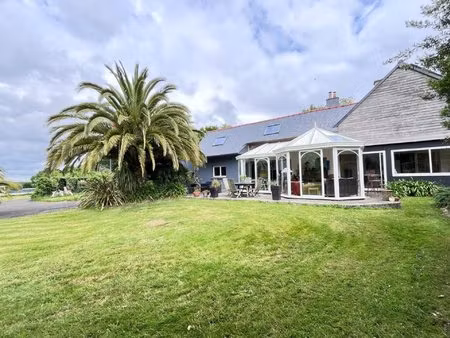 maison cosy de 114m² avec vaste véranda ouvert sur les jardins