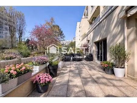 appartement spacieux avec terrasse  parking et cave au cœur de bécon