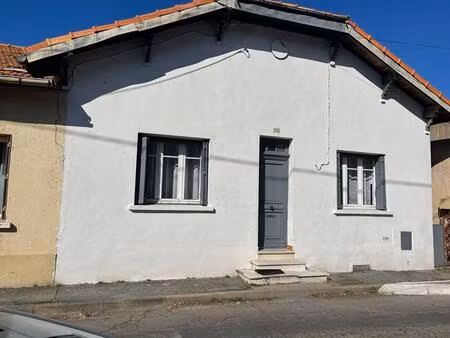 a vendre maison mitoyenne 3 pièces de 65 m2 avec grand garage sur terrain de 295 m2