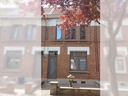 maison 3 chambres avec garage et jardin  proche du centre