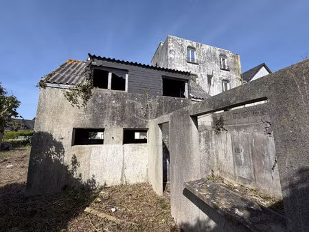 petite maison à rénover avec garages idéal investissement