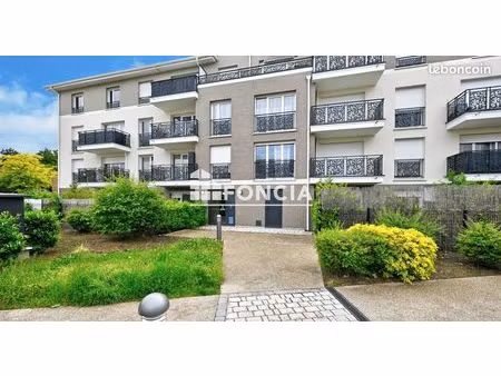 jouy-le-moutier f3 avec jardin et parking sous-sol dans une résidence de 2018