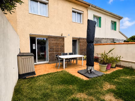 villa 2 faces avec jardin