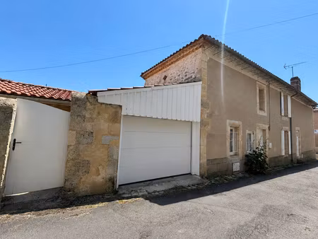 immeuble de centre-ville avec deux habitations indépendantes