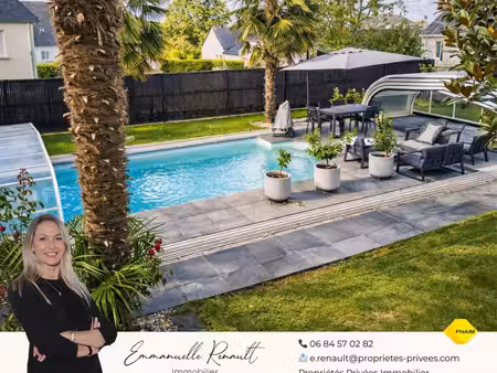 maison avec piscine. commerces à pied et cadre privilégié sur 930 m² de terrain. 15 minute