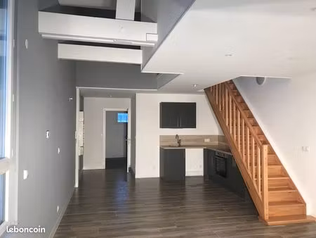 gravigny  t4 neuf duplex 65m2 avec place de parking  proche du collège