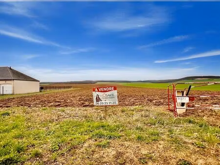 joli terrain de 1230 m2  dans village avec école