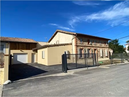 grande maison familiale avec jardin et garage au cœur de gagnac