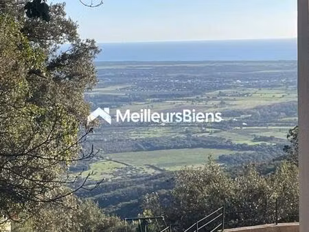 magnifique terrain constructible avec une vue dégagée sur la plaine et la mer