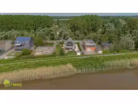 prachtige villa gelegen aan de schelde in grembergen