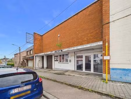 immeuble mixte : commerces  hangars et permis accordés