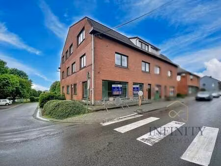 ensemble d'un appartement & rdc commercial - garage